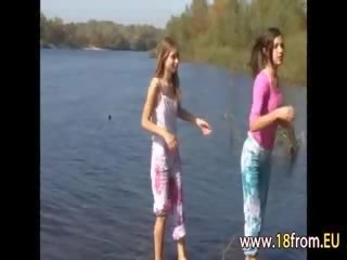 Two doll models Naked by the river