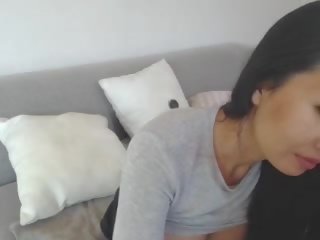 Tempting Asian Leilee Webcam Teasing on the Sofa: Free x rated clip 0e